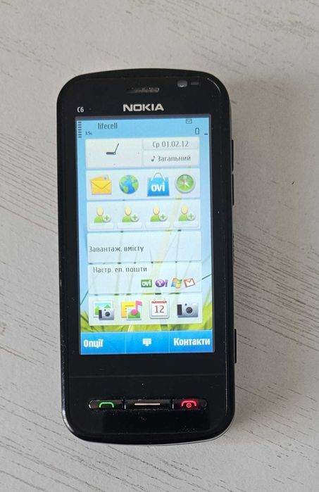 Nokia C6-00  бічний слайдер