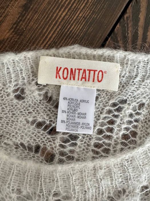 Стильний ажурний светр kontatto