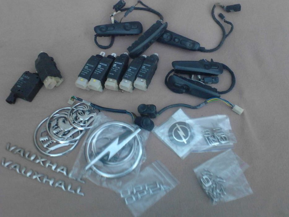 Актуаторы кнопки значки центральный замок Opel Omega B.