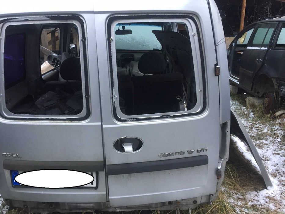 Двері задні ліва+права(розпашонка) Opel Combo