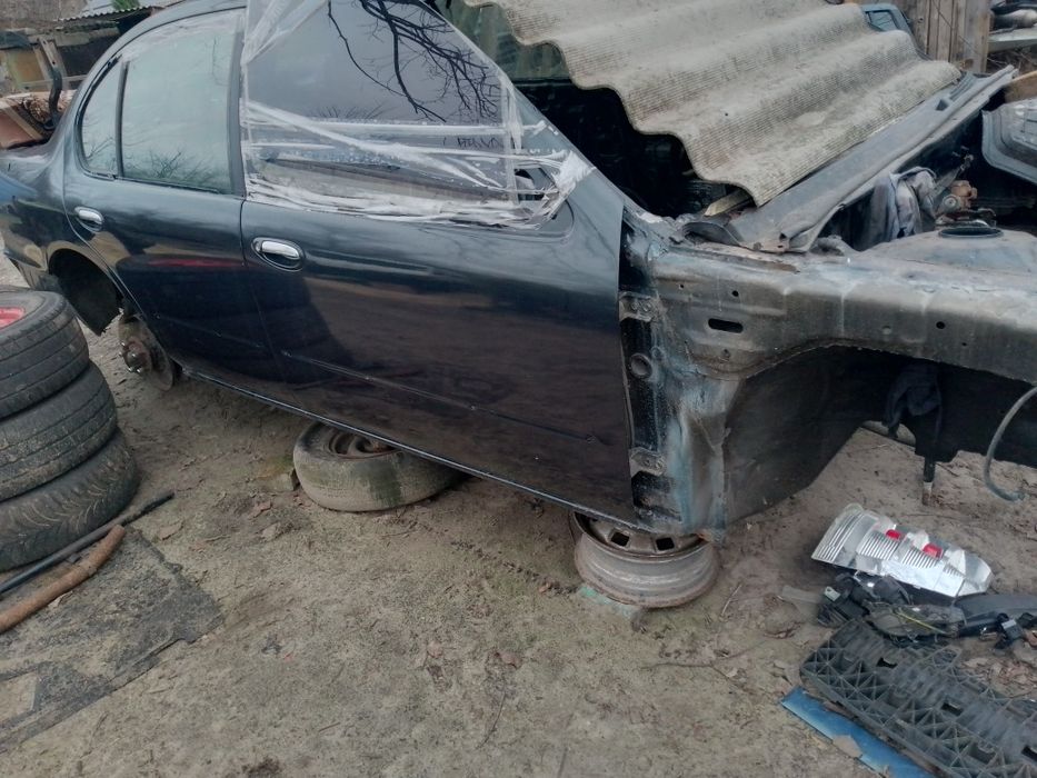 Двері Nissan Maxima A32