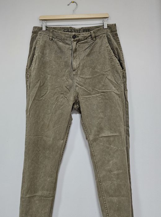 H & M spodnie męskie Carroll fit 32 zwężane nogawki khaki chinosy obniżony krok