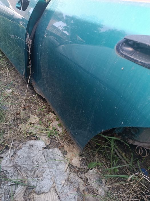 Двері Mazda 323 BA