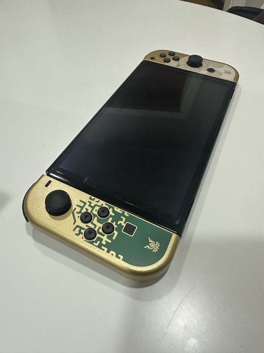 Nintendo Switch OLED + acessórios + jogos