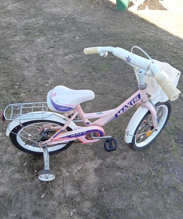 Велосипед для дівчинки на 5-9 років. Дуже зручний додаткові колеса.