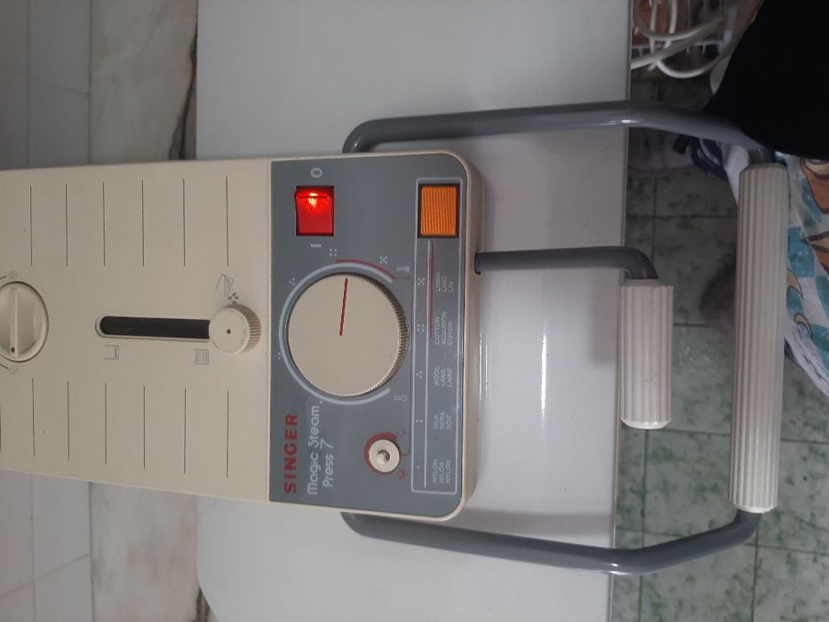 Tábua de engomar, ferro singer