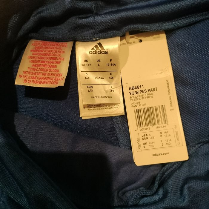 Dziewczęce nowe spodnie dresowe Adidas 164