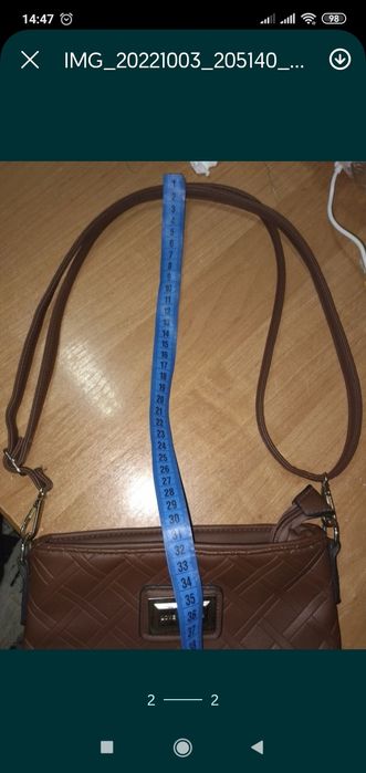 Жіноча сумка на бік.