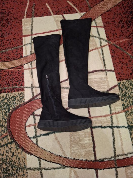 Długie czarne kozaki