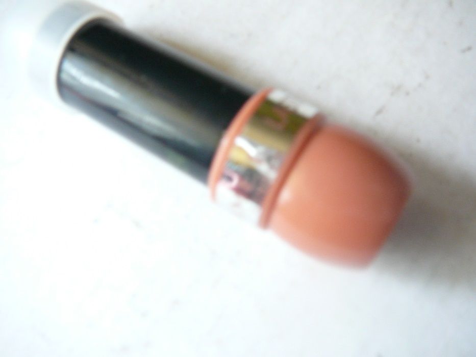 puder rozświetlający Impulse Body Shimmer ,szminka Rimmel +kosmetyczka