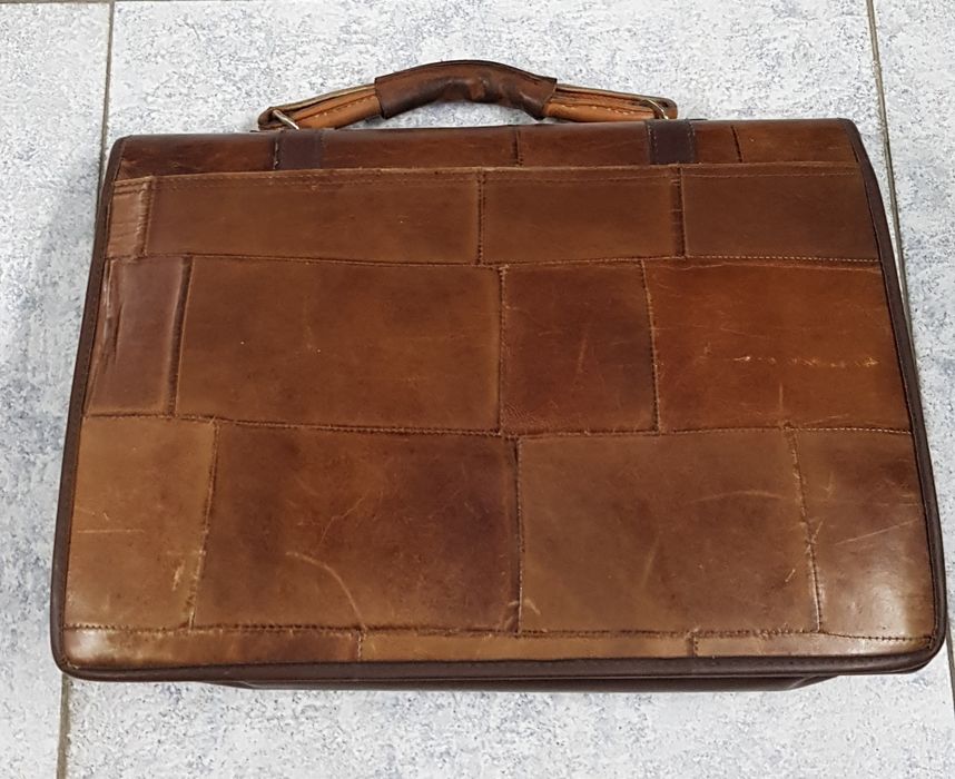 Mala castanha em pele