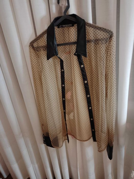 Blusa transparente swallow