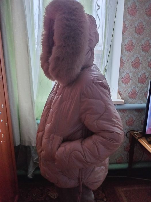 Жіноча пухова куртка