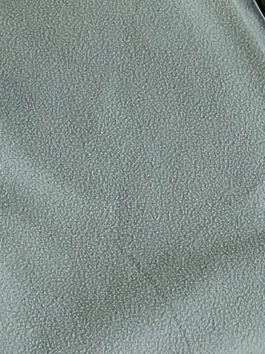 Dwa turkusowe pledy Ikea