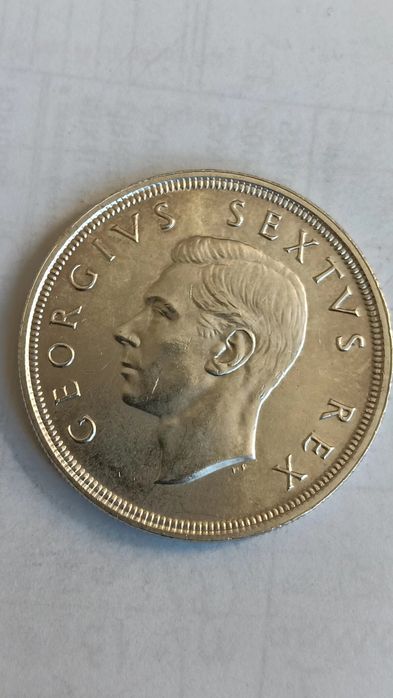 Moeda prata 800 de 5 shillings de 1948.