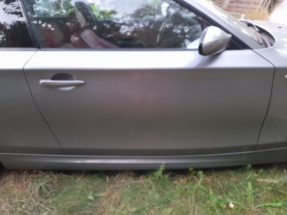 Bmw e81 e82 e88 kpl.drzwi prawe sparkling graphite a22 stan bdb
