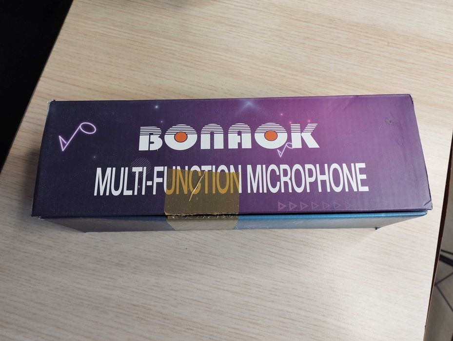 Bezprzewodowy mikrofon do karaoke Bluetooth firmy BONAOK.