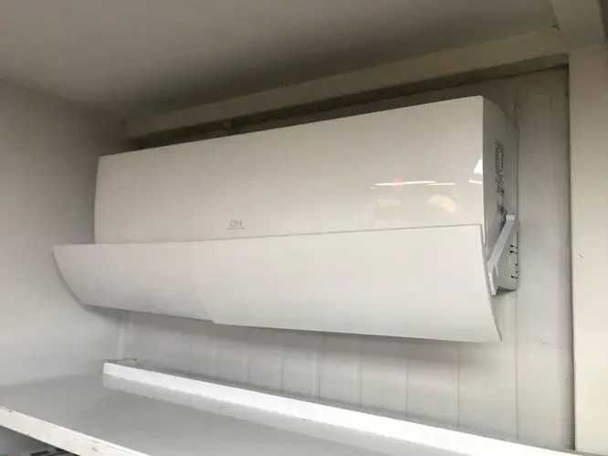 Дефлектор на кондиціонер регульований захисний екран антивітер