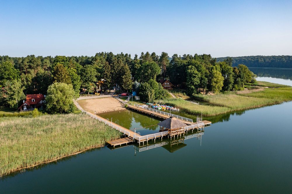 Domek nad jez. 6 os.- jacuzzi, pomost, łódka, kajak, deska SUP
