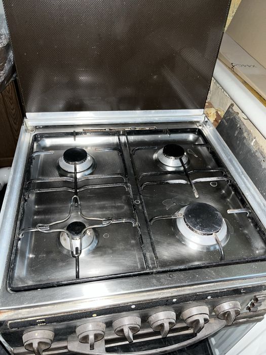 Газова плита Delonghi