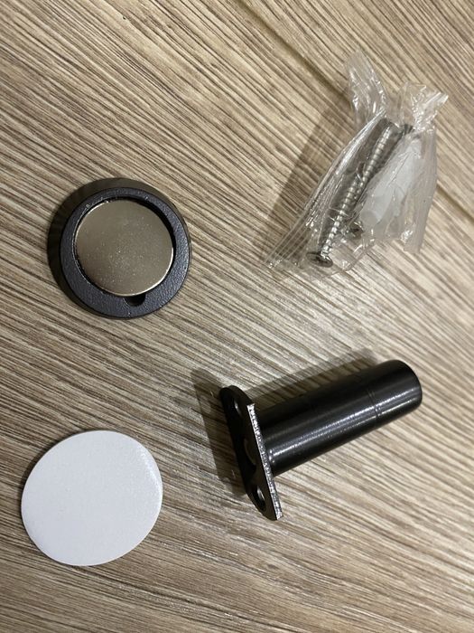 Прихований магнітний фіксатор дверей