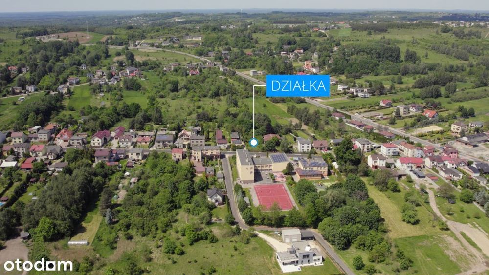 Działka pod budowę domu w zielonej okolicy .