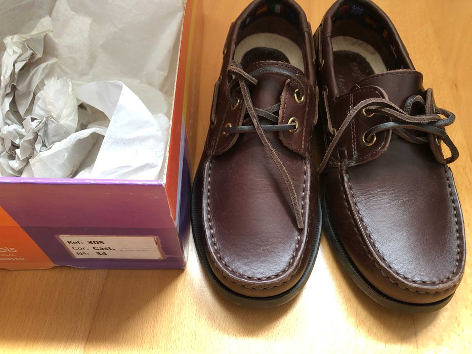 Sapatos de vela pele