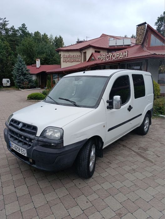 Машина Fiat Doblo