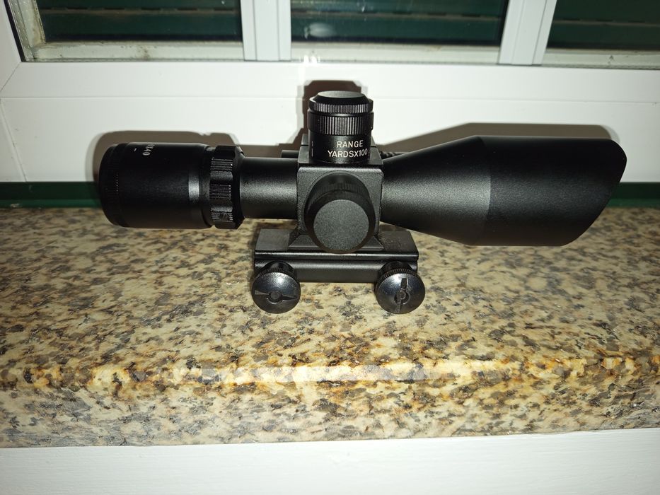 Mira de rifle com laser