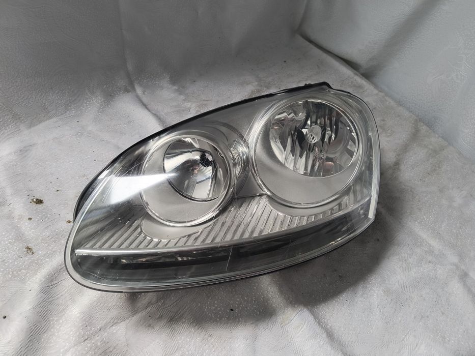 Lampa lewa VW Golf V 5 Europa reflektor przedni
