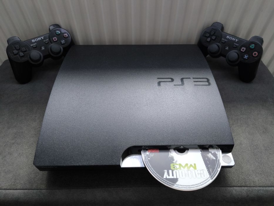 PlayStation 3 Slim CECH‑2504B + 2× DualShock 3