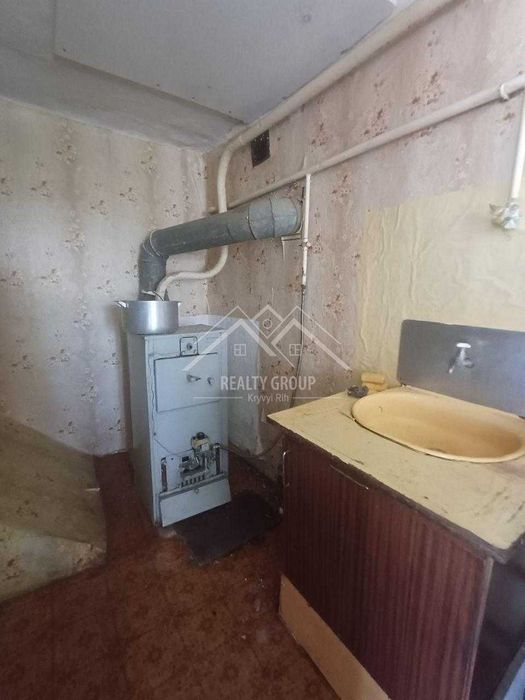 Продаж будинку в центрі с. Лозуватка з гаражем, літнею кухнею.