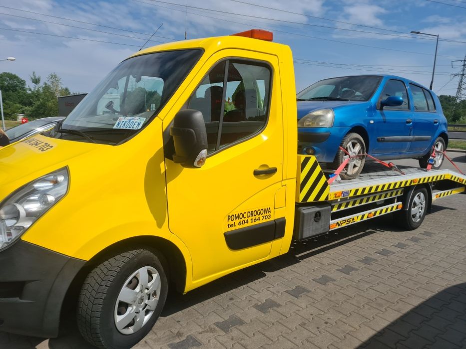 Pomoc drogowa-usługi transportowe lawetą-holowanie