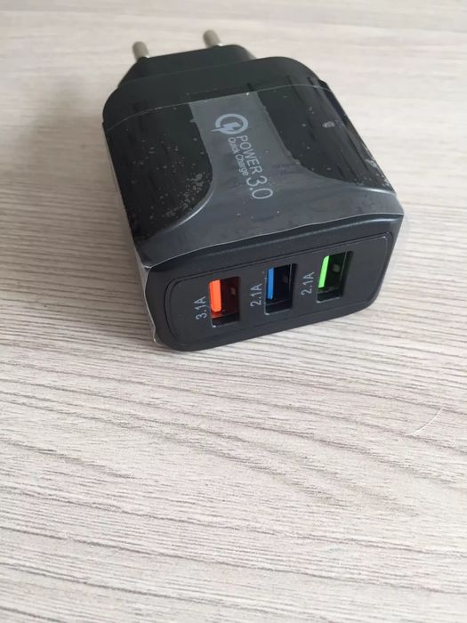 Carregador telemovel - Novo