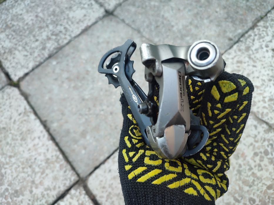 Задний переключатель Shimano DEORE LX RD-M580 GS на 9 скоростей: 1