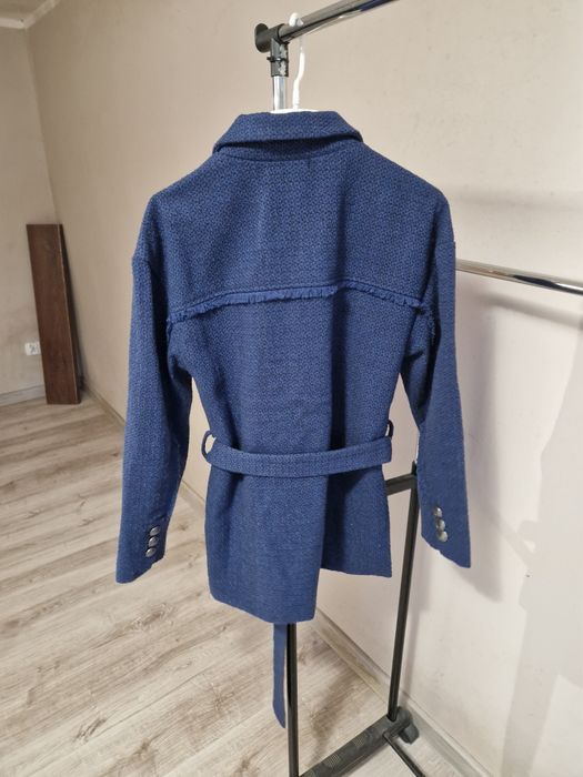 Nowy damski płaszcz