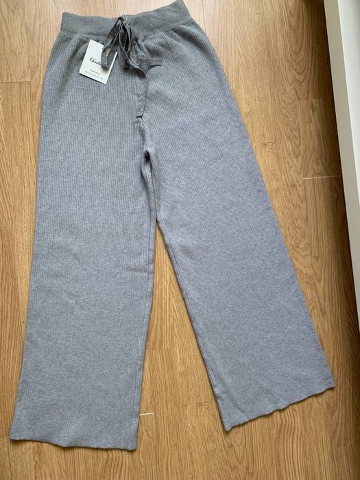 Сірі жіночі штани, широкі в рубчик