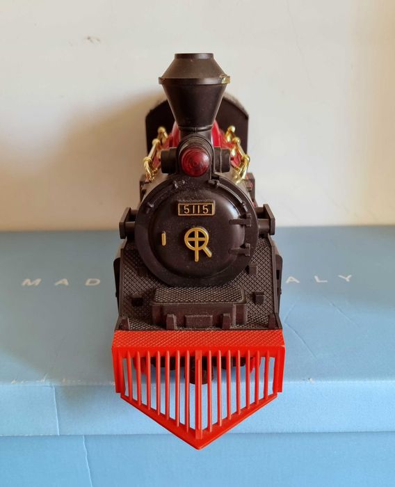 Comboio vermelho, preto e dourado