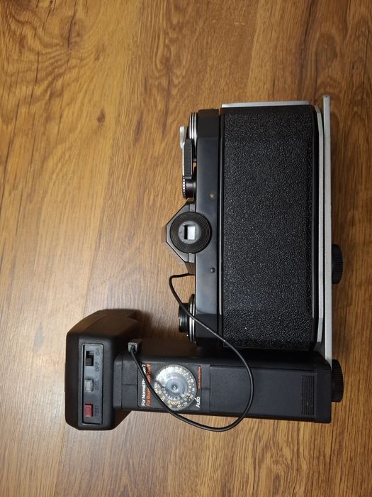 Aparat Praktica super tł z obiektywem Pentagon 50mm 1.8 i lampa erno