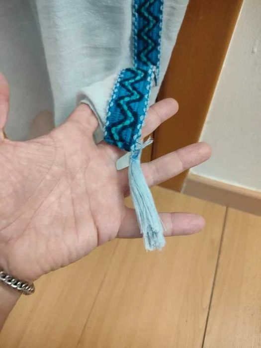 cachecol ou echarpe de um tom de azul claro
