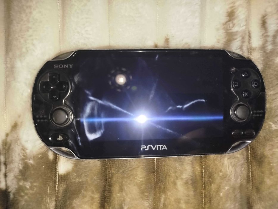 PS Vita Oled com 5 jogos e carregador