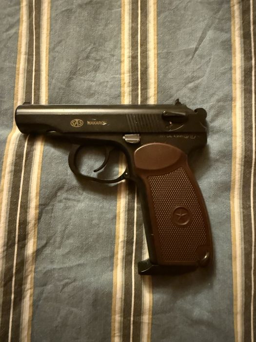 Игрушечный пистолет