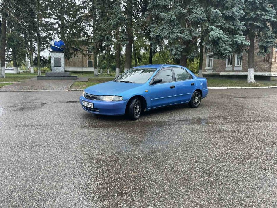 Mazda 323 автомат газ/бензин