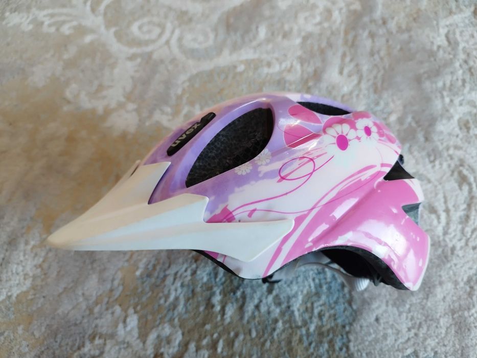 Kask rowerowy dziewczęcy Uvex orzeszek 49-54cm