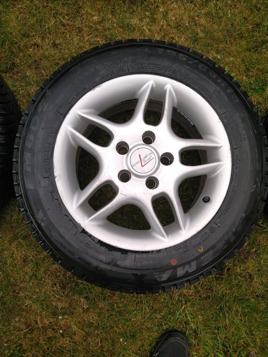 Nowe opony z alufelgami 15