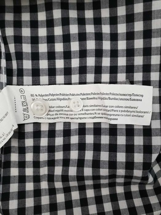 Camisa aos quadrados pretos e brancos