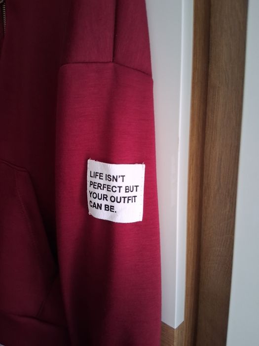 Bluza rozpinana z kapturem nowa masełko