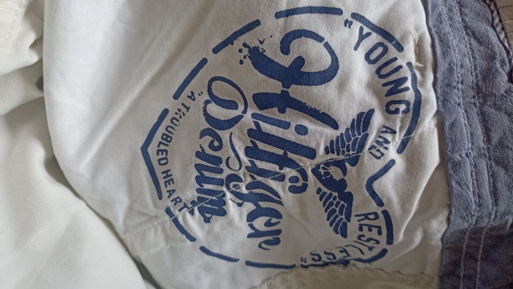Męskie bawełniane jasne spodnie Tommy Hilfiger rozmiar 32/32