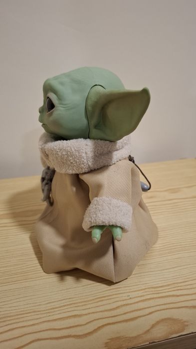 Baby Yoda como novo