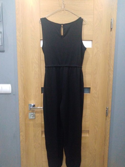 Fajny czarny kombinezon rozm M/XL biust 96/110cm
